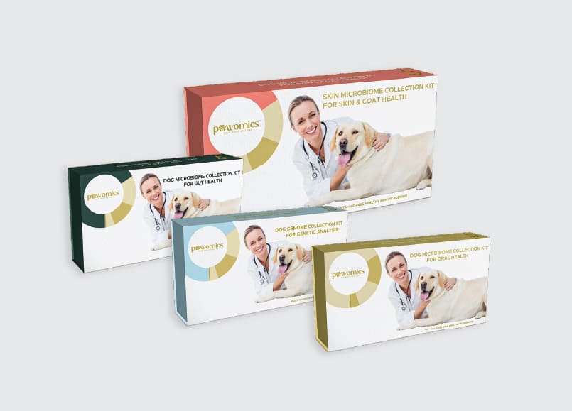 Collection of pet health test kit boxes with a dog and a person on the packaging.