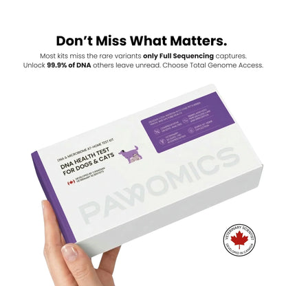 Pawomics DNA health test kit for dogs and cats held by a hand on a white background