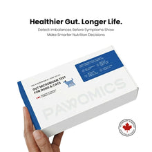 Pawomics gut microbiome test kit for dogs and cats held by a hand on a white background